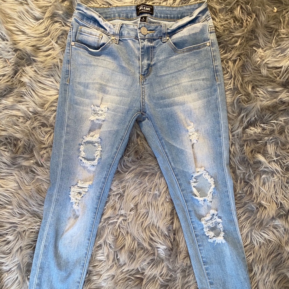 Ripped mid rise jeggings